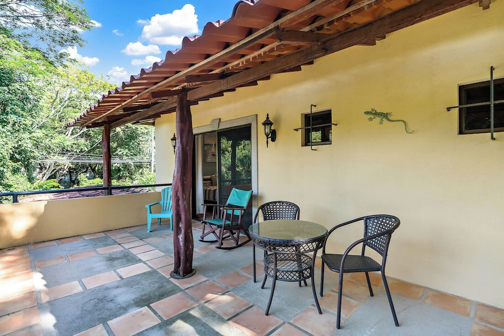 Inviting Home with Colorful Decor and Private Backyard Oasis with a Swimming Pool & Shaded Terrace