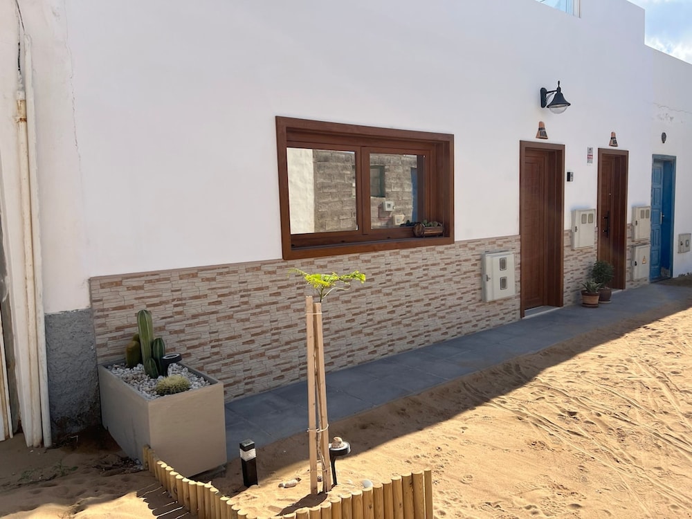Bayside La Graciosita Traditional Home