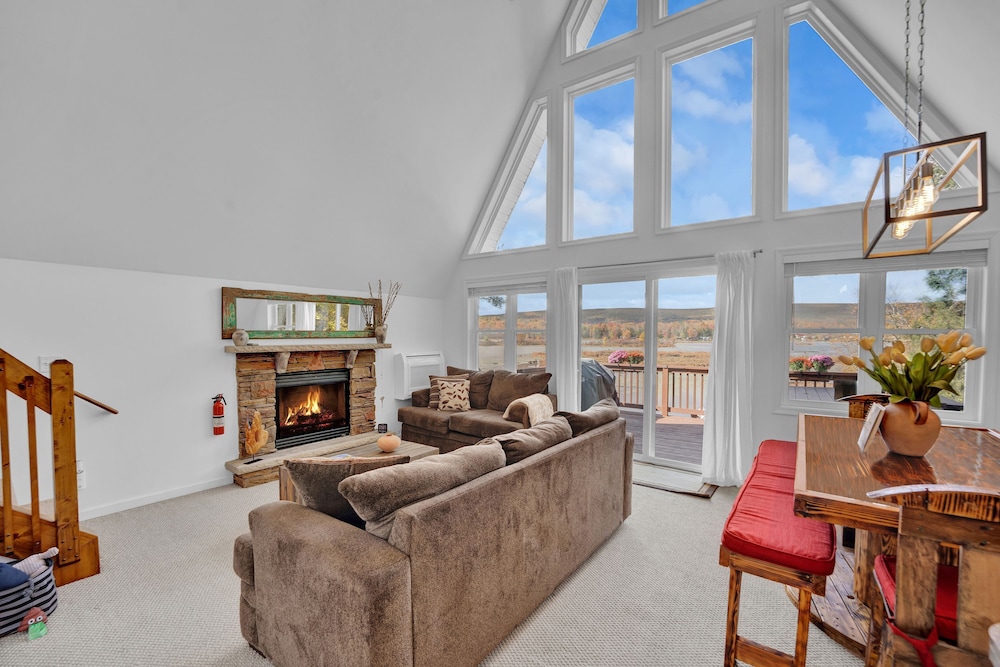 Lakefront A-frame Dock Kayaks Fire Place
