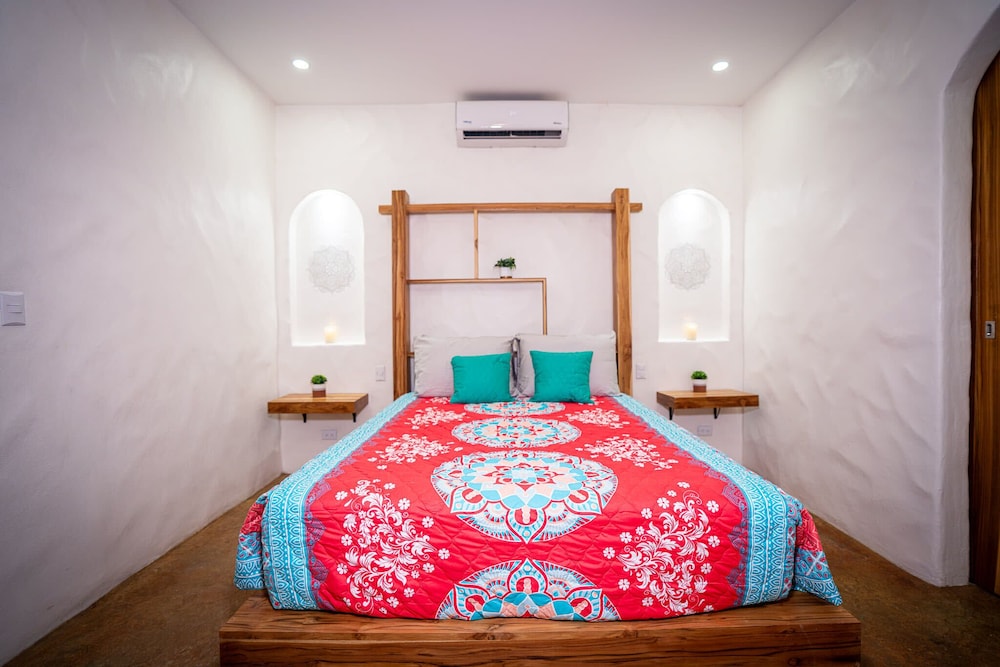Bohemian Tropical Villa with a Tiki-Style Swimming Pool & Swim-Up Bar with an Attached Studio Apartment