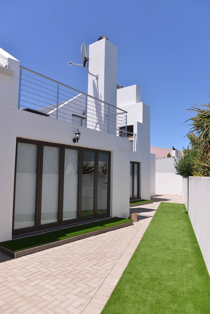 Pelican Cove is a Modern 4-bedroom Holiday Home in Langebaan With Some Sea Views