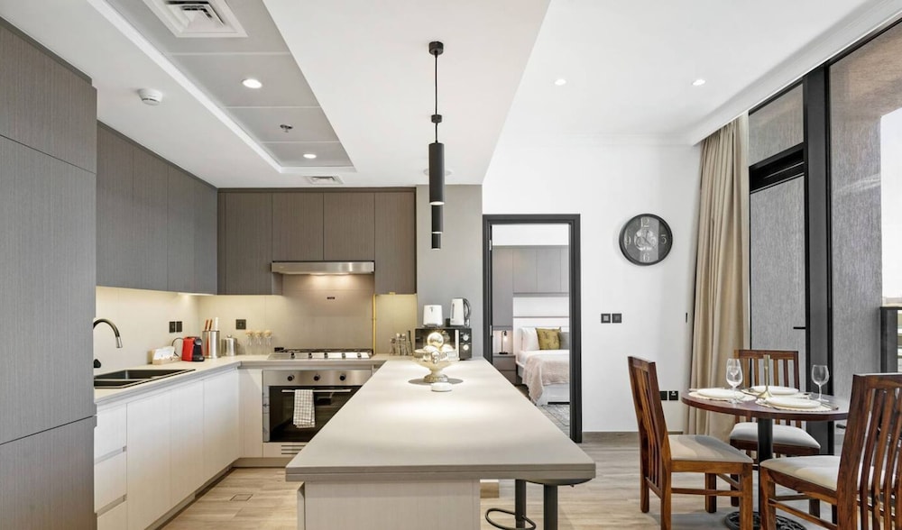 Stylish 1BR Apt w Pool in JVC nr Dubai Sports City