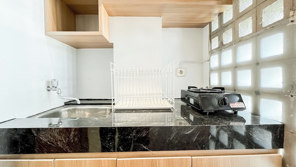 Neutral Cozy Stay Studio Apartment At Margonda Residence 1