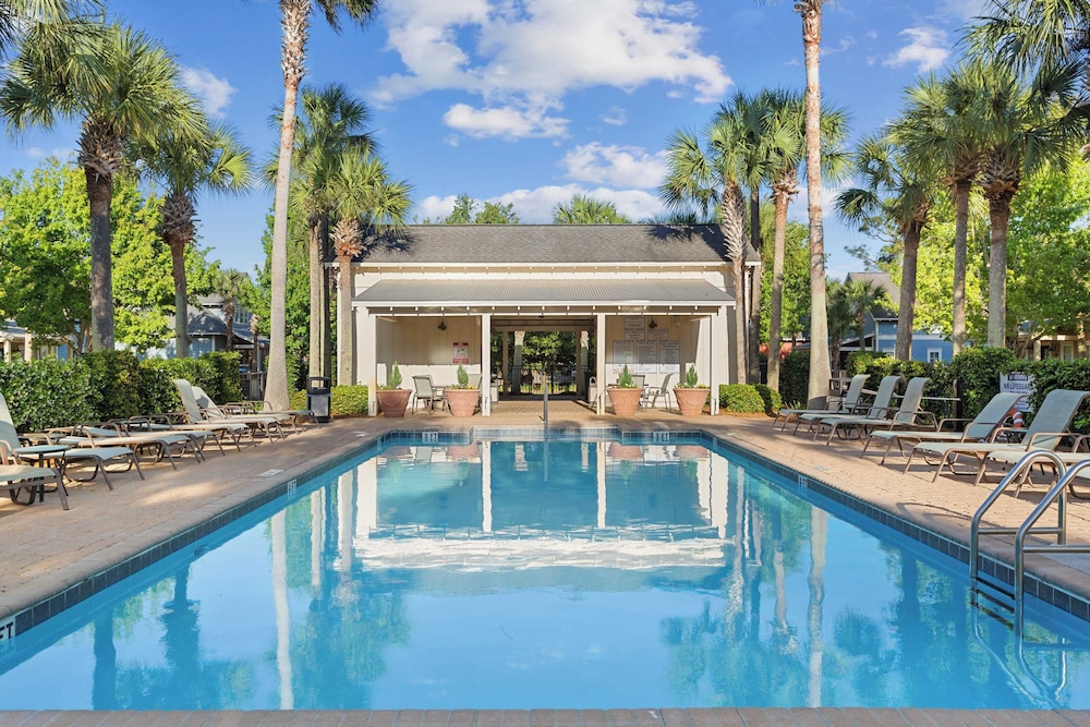 Golf Cart + Pool Access Near Baytowne & Beach Coral Starfish by Avantstay