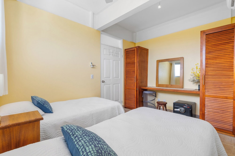 Modern Top-Floor Condo with Panoramic Views and Community Pool