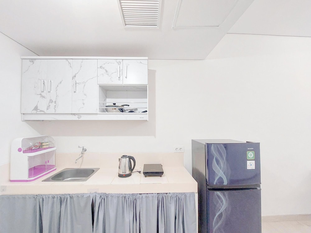 Homey And Compact 2Br Podomoro City Deli Medan Apartment