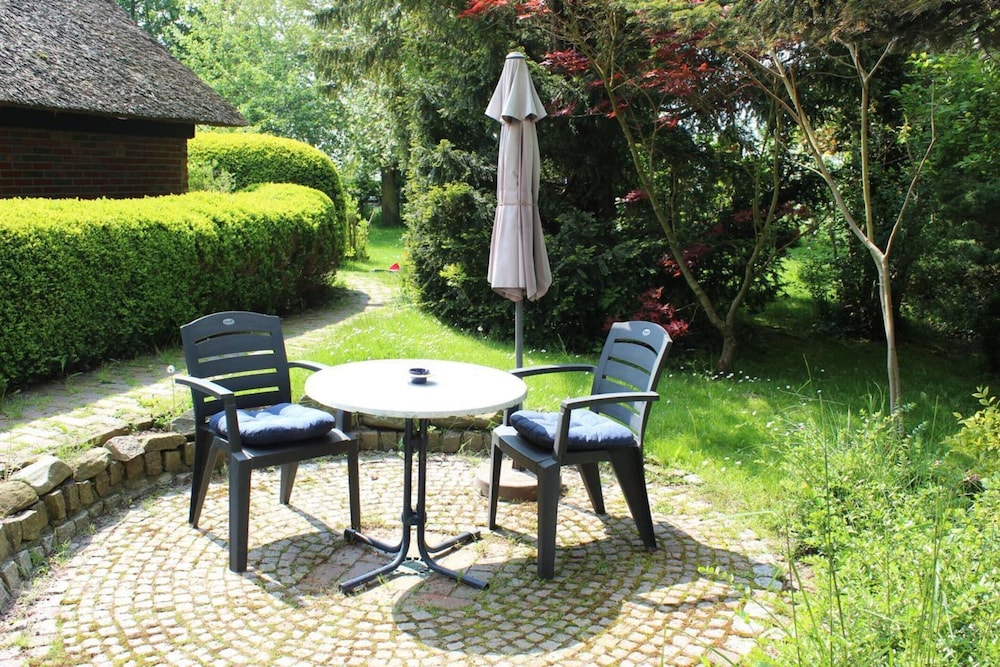 Ferienwohnung im Reetdachhaus, Burhave