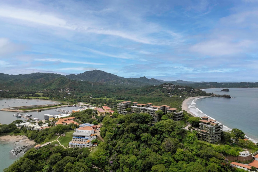 Luxury Condo with Panoramic Ocean Views, Sparkling Infinity Pool, and Modern Open-Concept Design