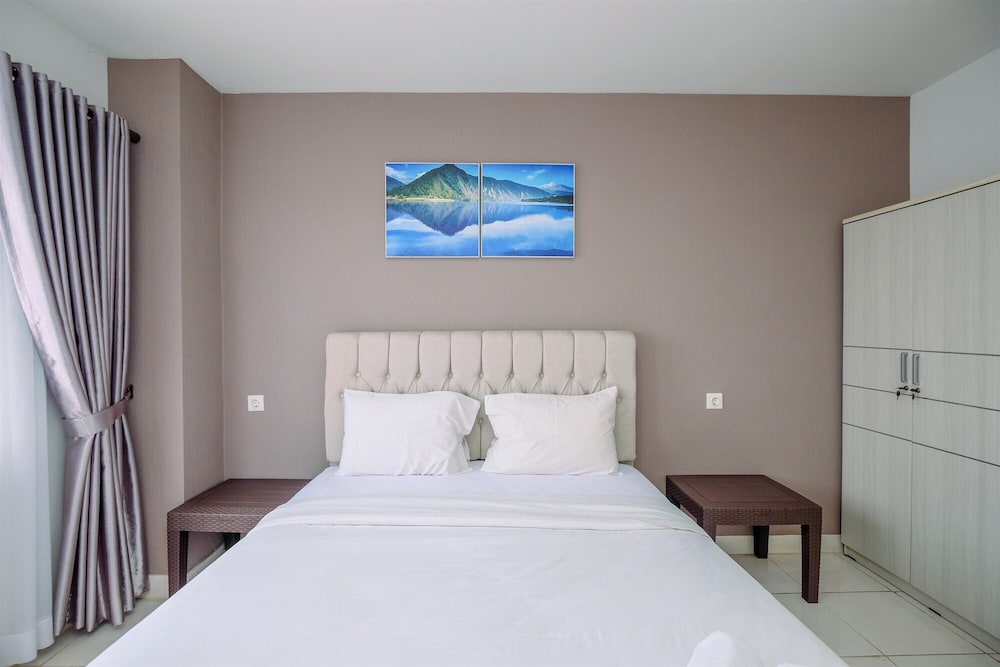 Comfort and Homey 2BR at Sentul Tower Apartment