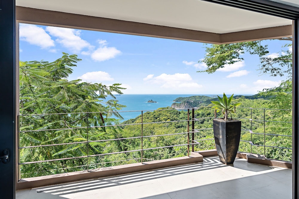 Luxury 5BR Oceanview Villa with Infinity Pool, King Beds, and Sunset Views Over Playa Prieta