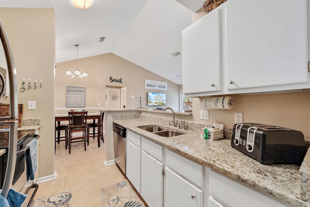 Charming Condo With Luxe Amenities Less Than 10 Minutes From the Beach
