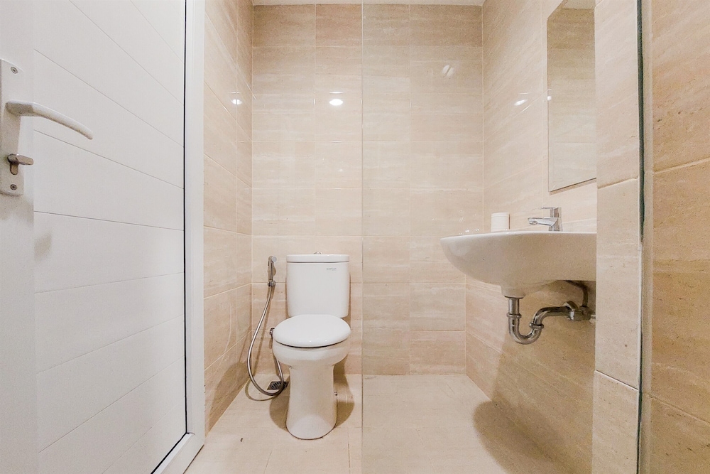 Spacious and Homey 2BR at Springwood Residence Tangerang Apartment