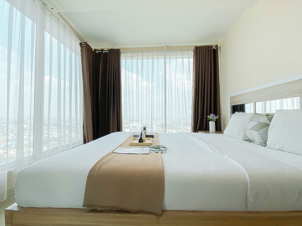 Simple And Homey 2Br At Grand Kamala Lagoon Apartment