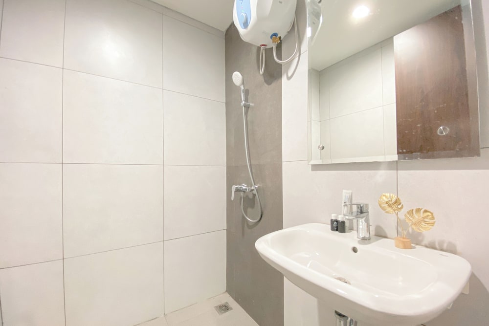 Simple White Designed Studio At Lrt City Bekasi Apartment