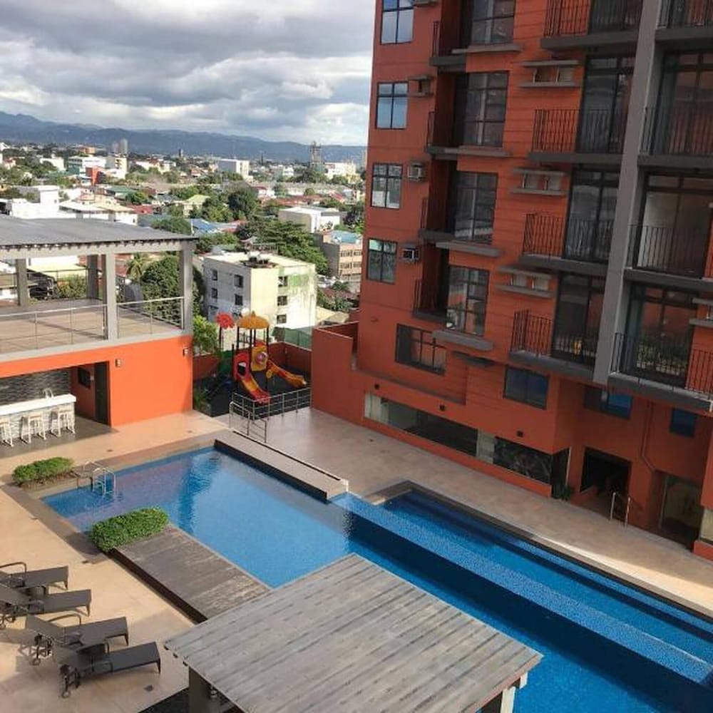 Araneta Cubao No Brown Outs 1BR Furnished Condo With Balcony Free Wifi Netflix