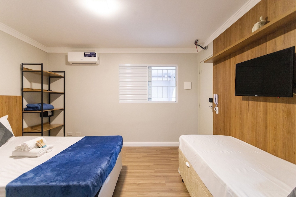 Casa Jardim. Ar e garagem