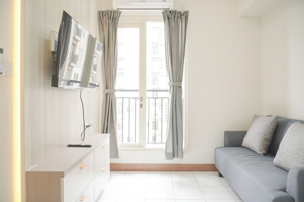 Minimalist and Restful 2BR at Podomoro Golf View Apartment