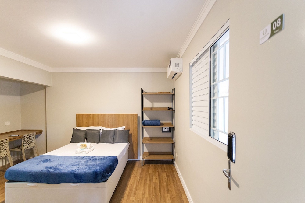 Casa Jardim. Ar e garagem