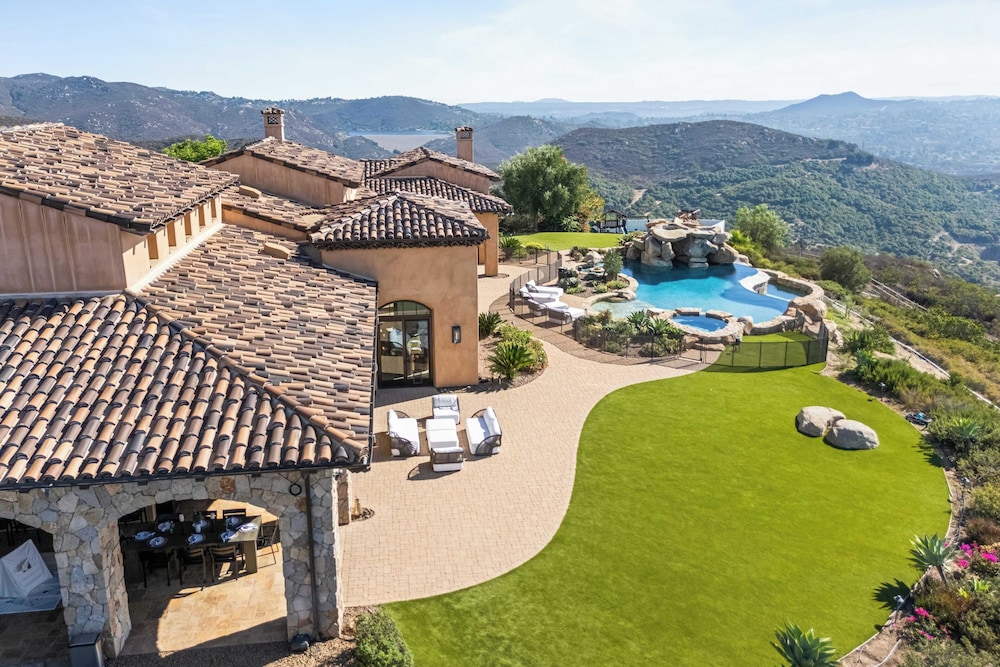 Infinity Pool, Theater, Pickleball + 360 Views Near Lake Poway Sunset Point Estate by Avantstay