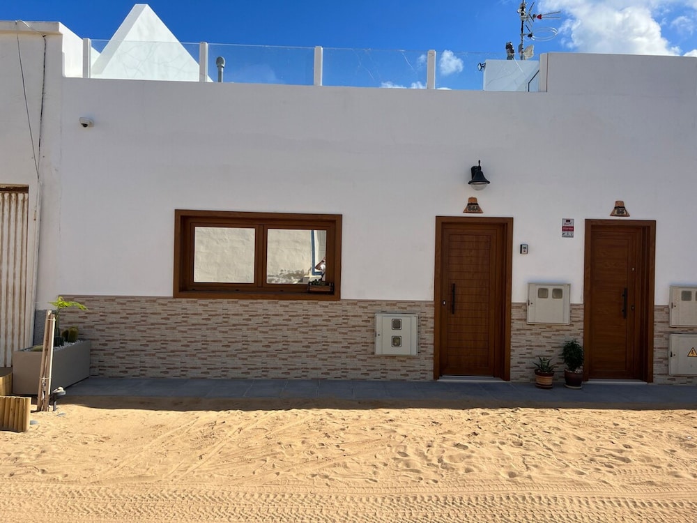 Bayside La Graciosita Traditional Home