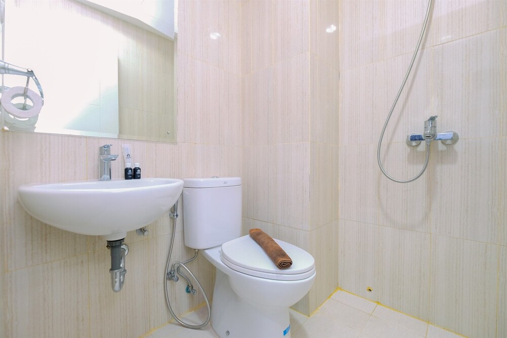 Restful and Modern 2BR at Sentul Tower Apartment