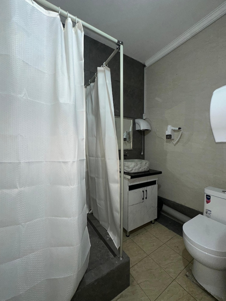 Rooms Tolebi.