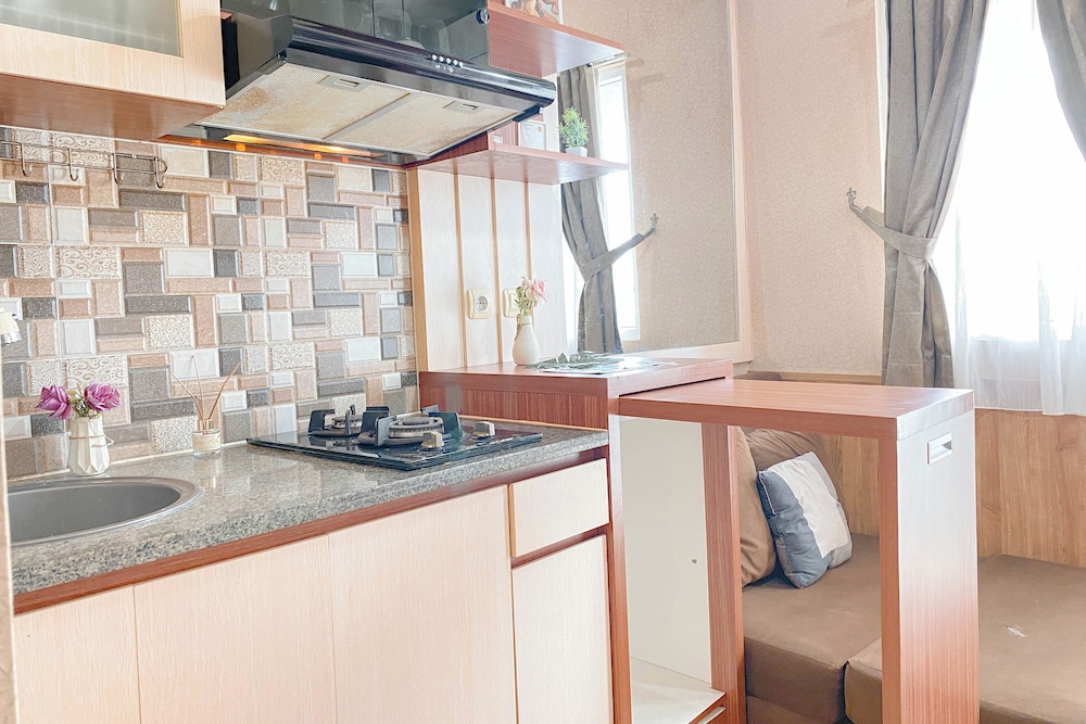 Simple Style 2Br At Green Pramuka City Apartment