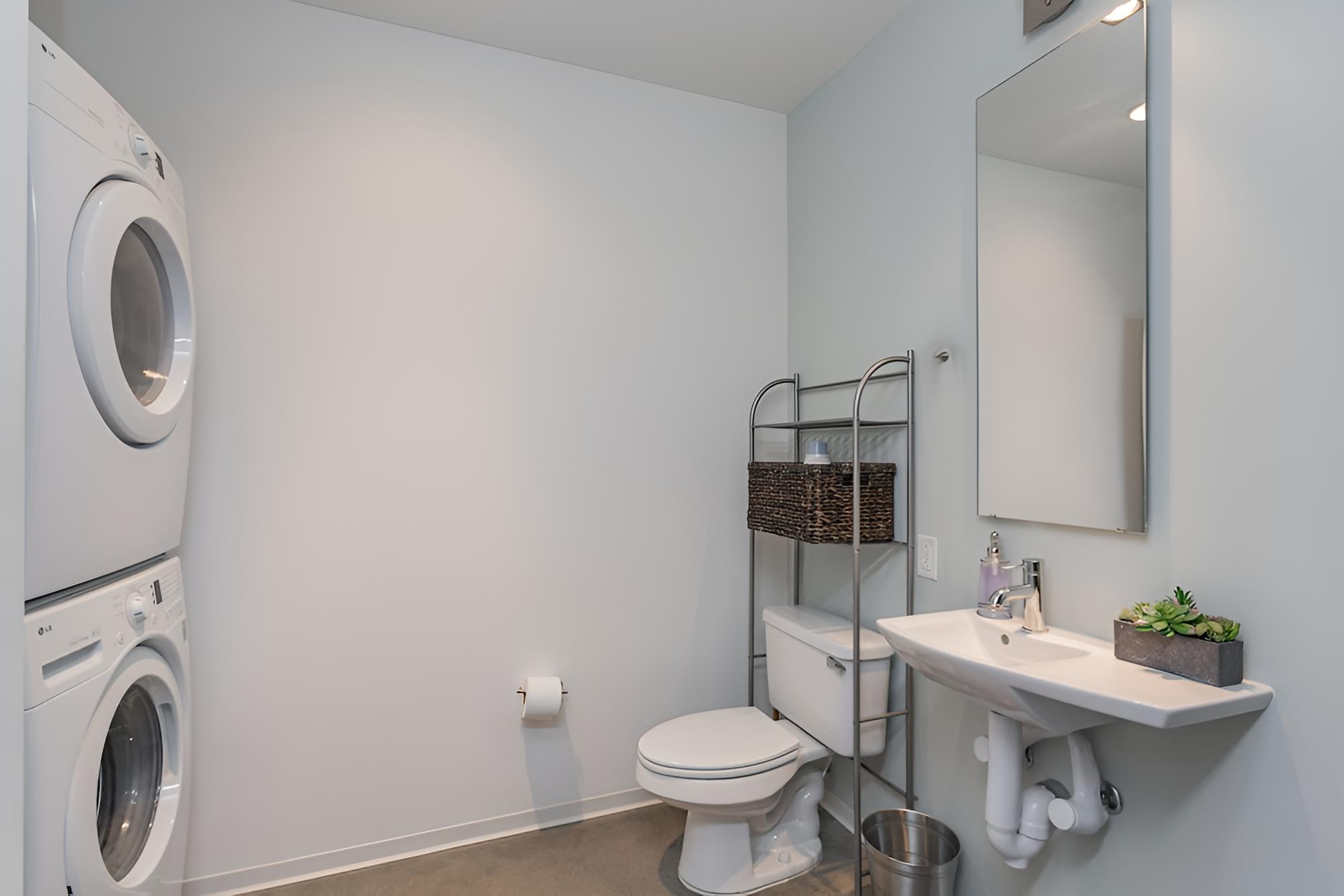 Industrial Chic Condo with Balcony view 4