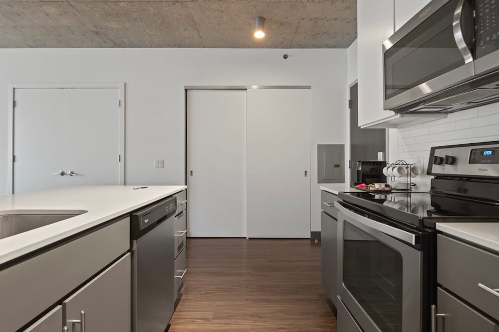 Urban Retreat 2BR City Views Near Shops