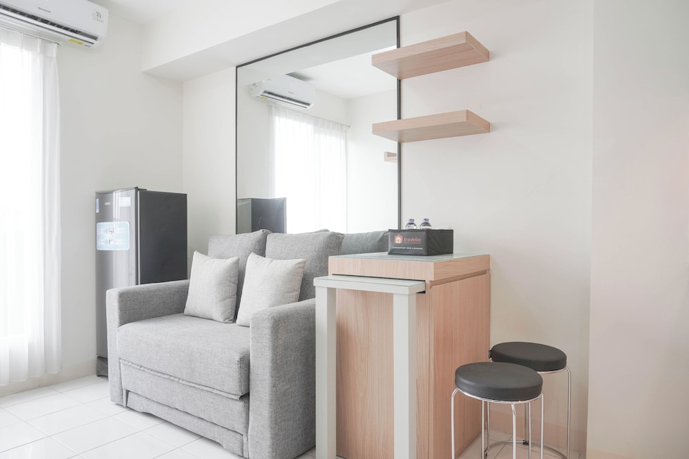 Homey and Minimalist 2BR at Podomoro Golf View Apartment
