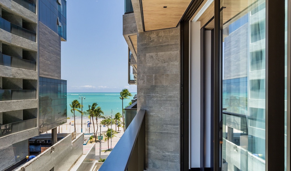 NWTs - Estúdios com Vista Lateral Mar
