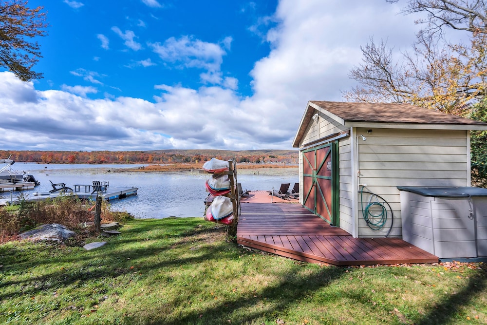 Lakefront A-frame Dock Kayaks Fire Place