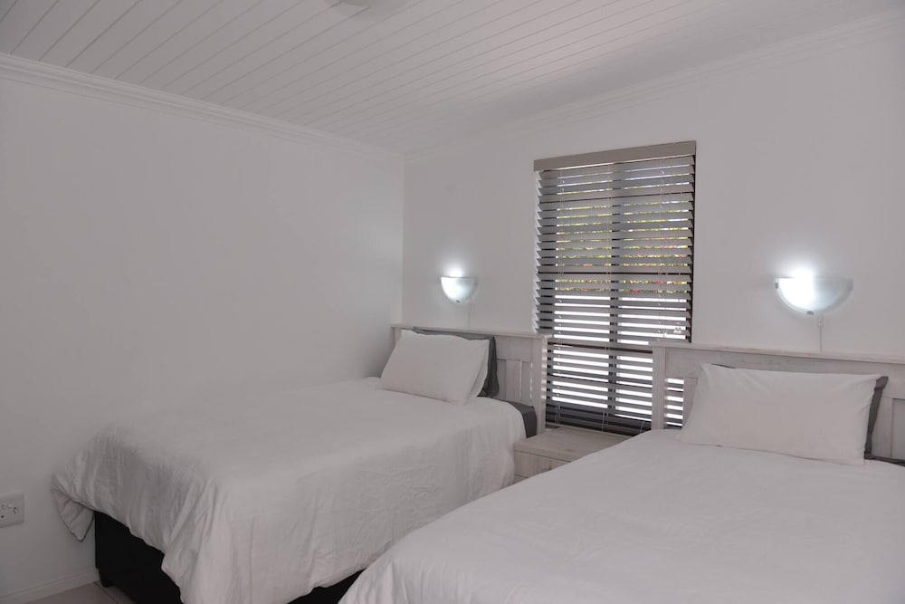 Pelican Cove is a Modern 4-bedroom Holiday Home in Langebaan With Some Sea Views