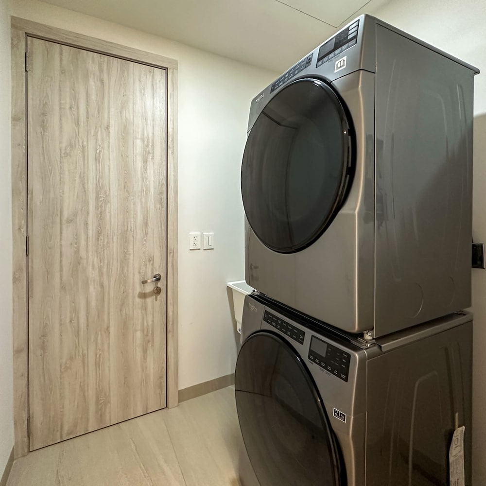 Brand-new Modern 2BR Gem on Iconic Sandy Beach