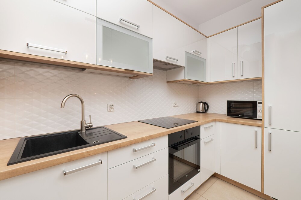 Apartment Manufaktura Łódź by Renters