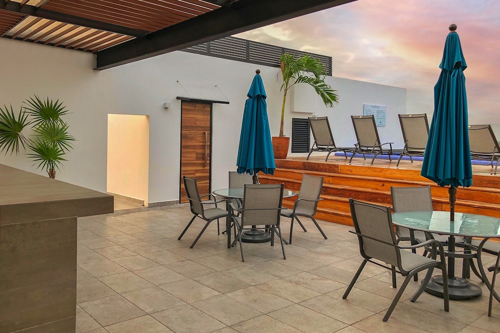 Luxe Condos Complex with Roof Pool