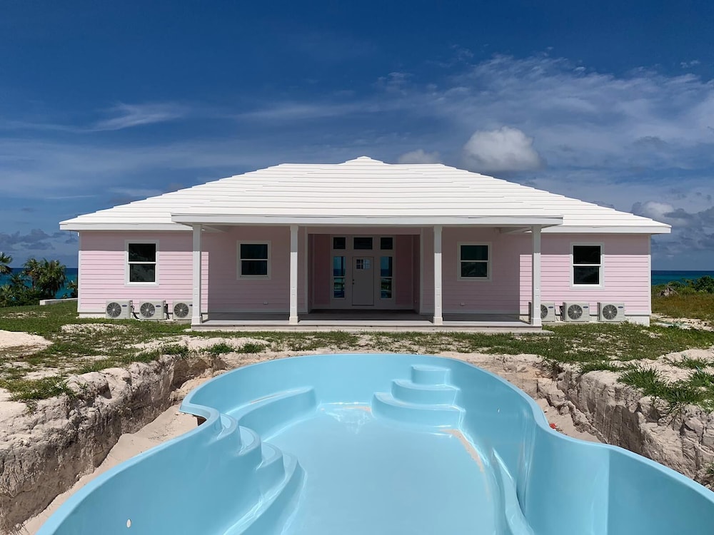 Twin Coves Tranquility: Private Beachfront Estate