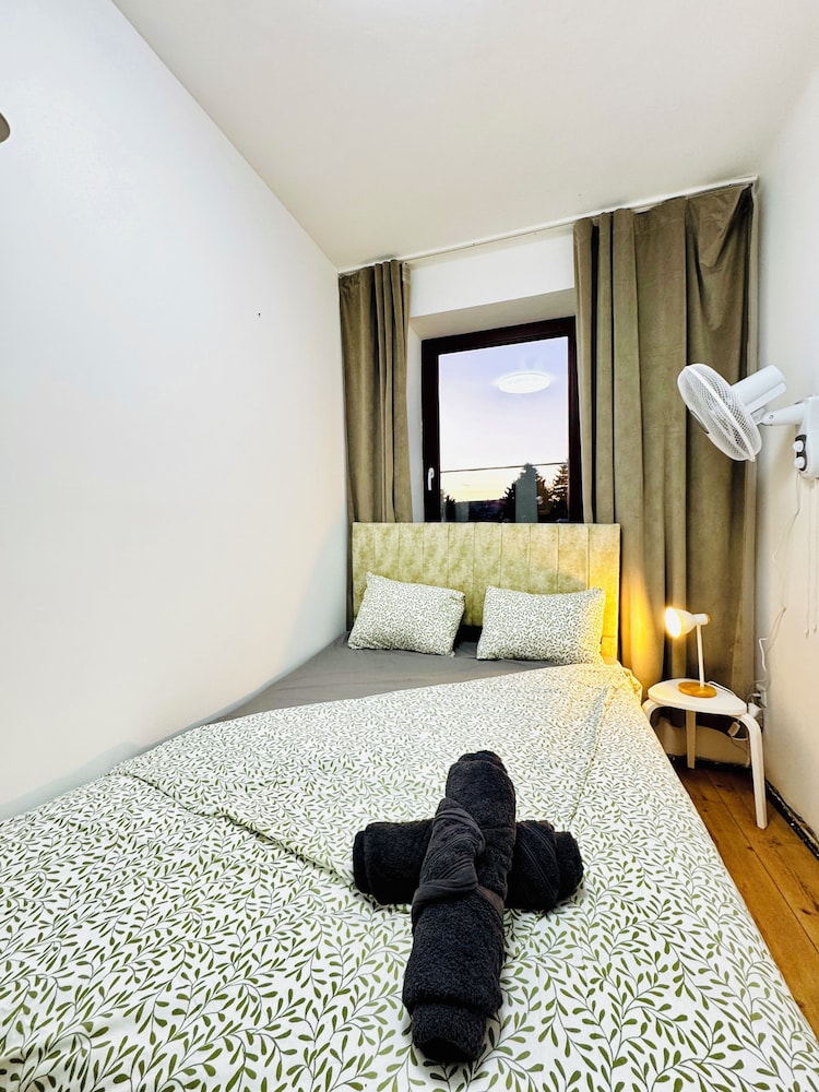 Central 8BR Stay with Garden and Terrace