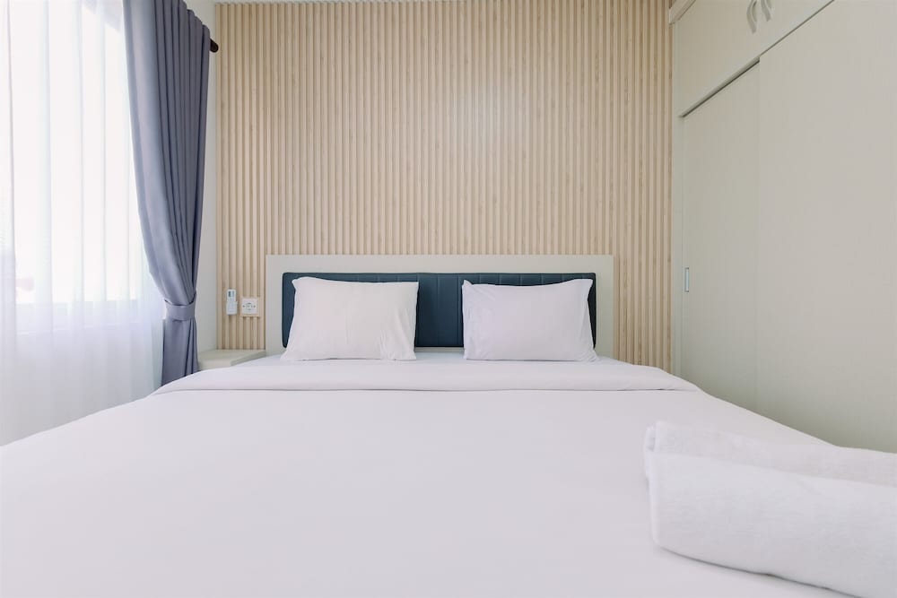 Restful and Modern 2BR at Sentul Tower Apartment