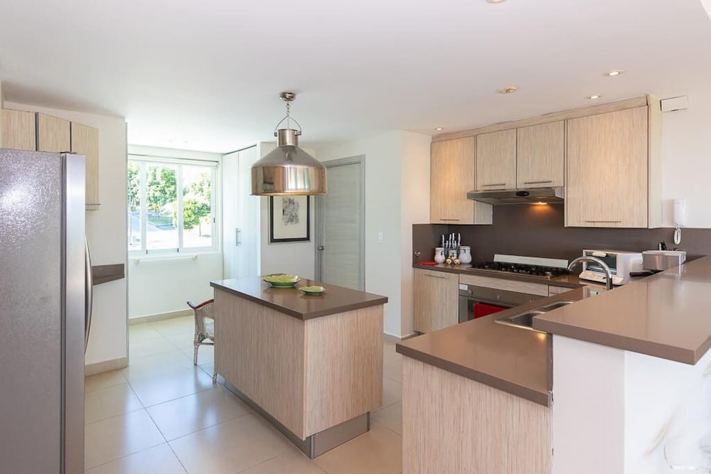 The Beach-front Condo by Acomodo Long Stay Only