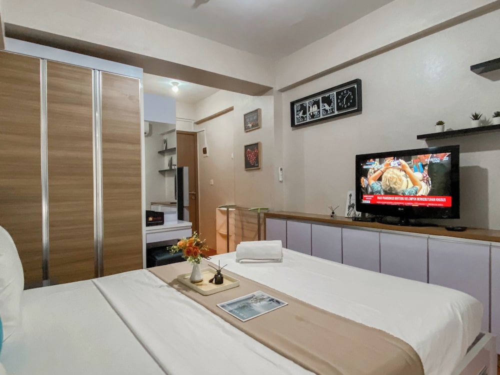 Warm and Homey Studio at Podomoro Golf View Apartment
