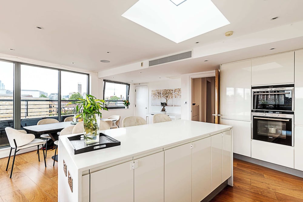 Modern Haven With Terrace View & Urban Charm