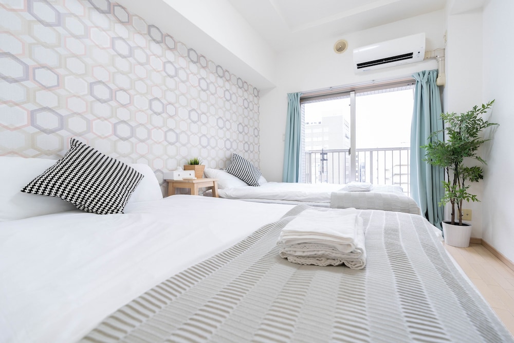 Shinsaibash East Nana Apartment · Junan