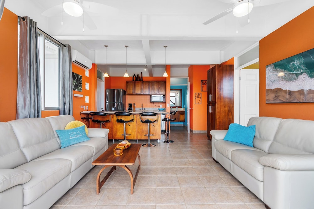 Modern Top-Floor Condo with Panoramic Views and Community Pool