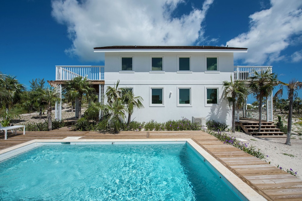 Tropical Haven: Luxurious Home Steps From Beach