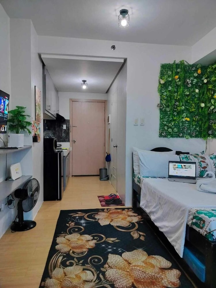 Cozy City View Condo in Quezon City - Your Home Away From Home