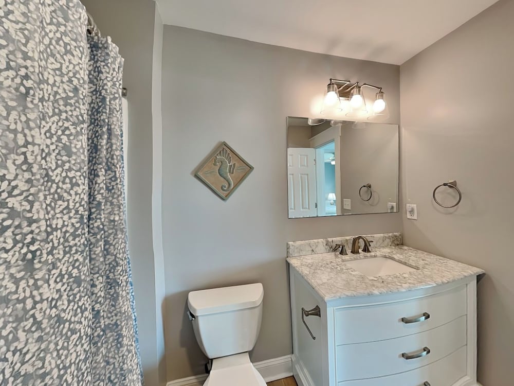 Squirrelly Banana by Topsail Realty