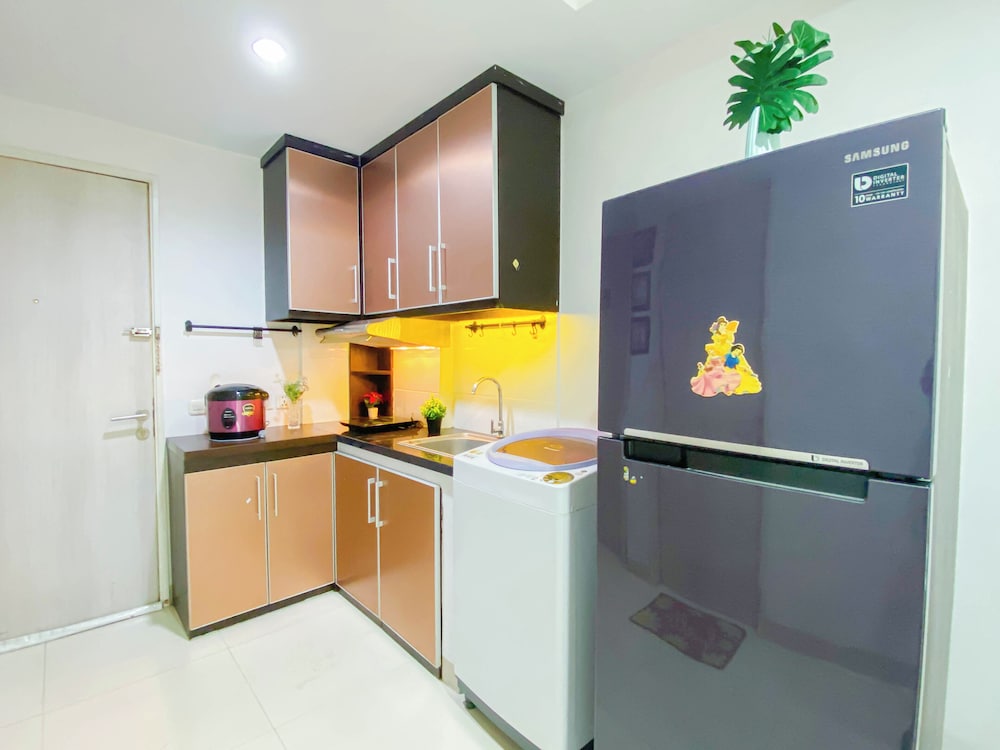 Simple 2Br At Azalea Suites Apartment