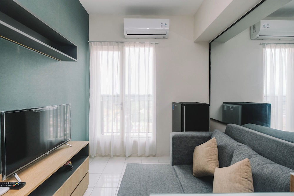 Simple and Cozy Living 2BR at Podomoro Golf View Apartment