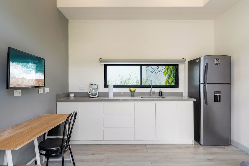 Sprawling Modern Property with a Tranquil Outdoor Living Space, swimming pool, and a private Casita
